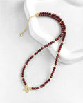garnet initial necklace with gold plating