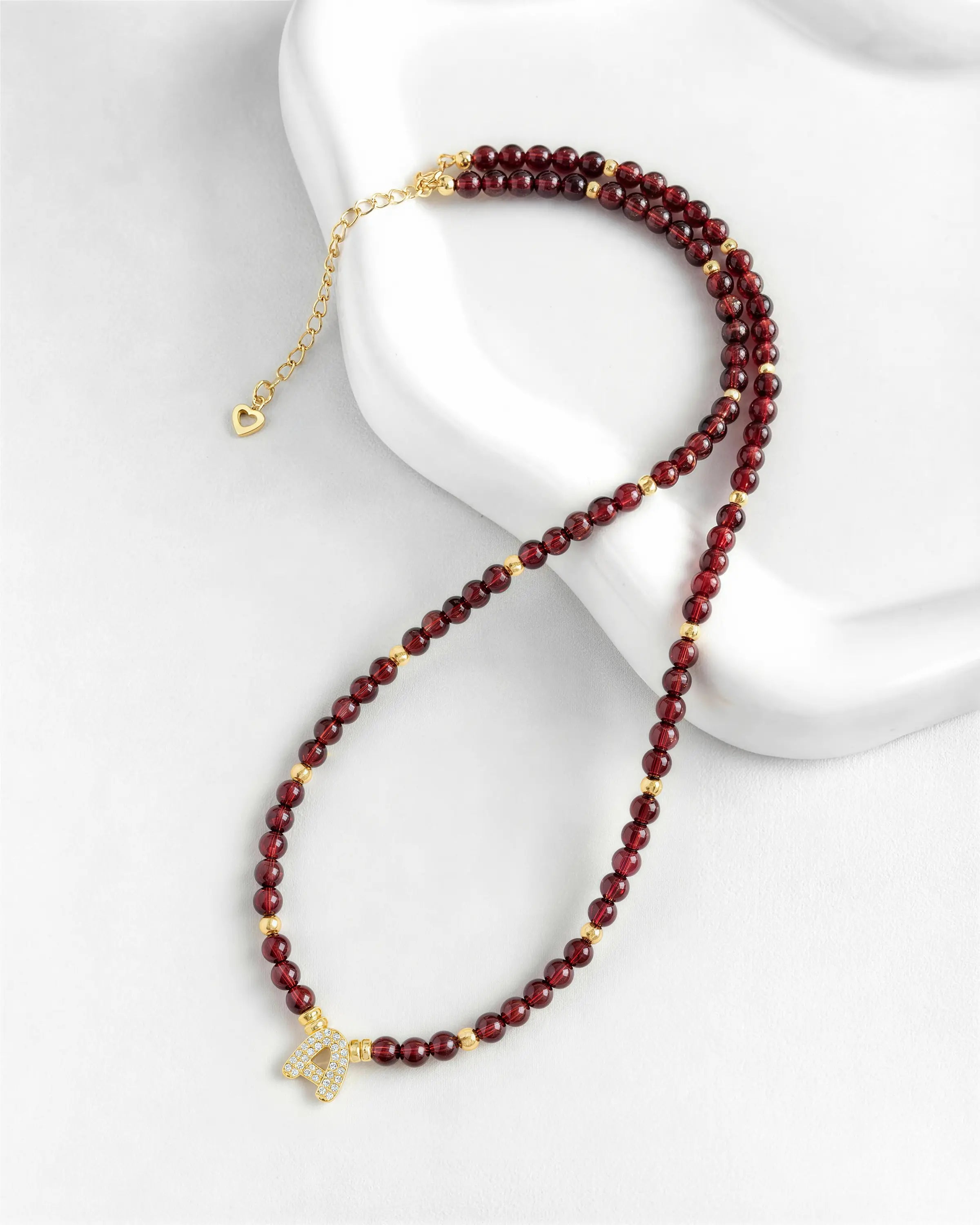 garnet initial necklace with gold plating