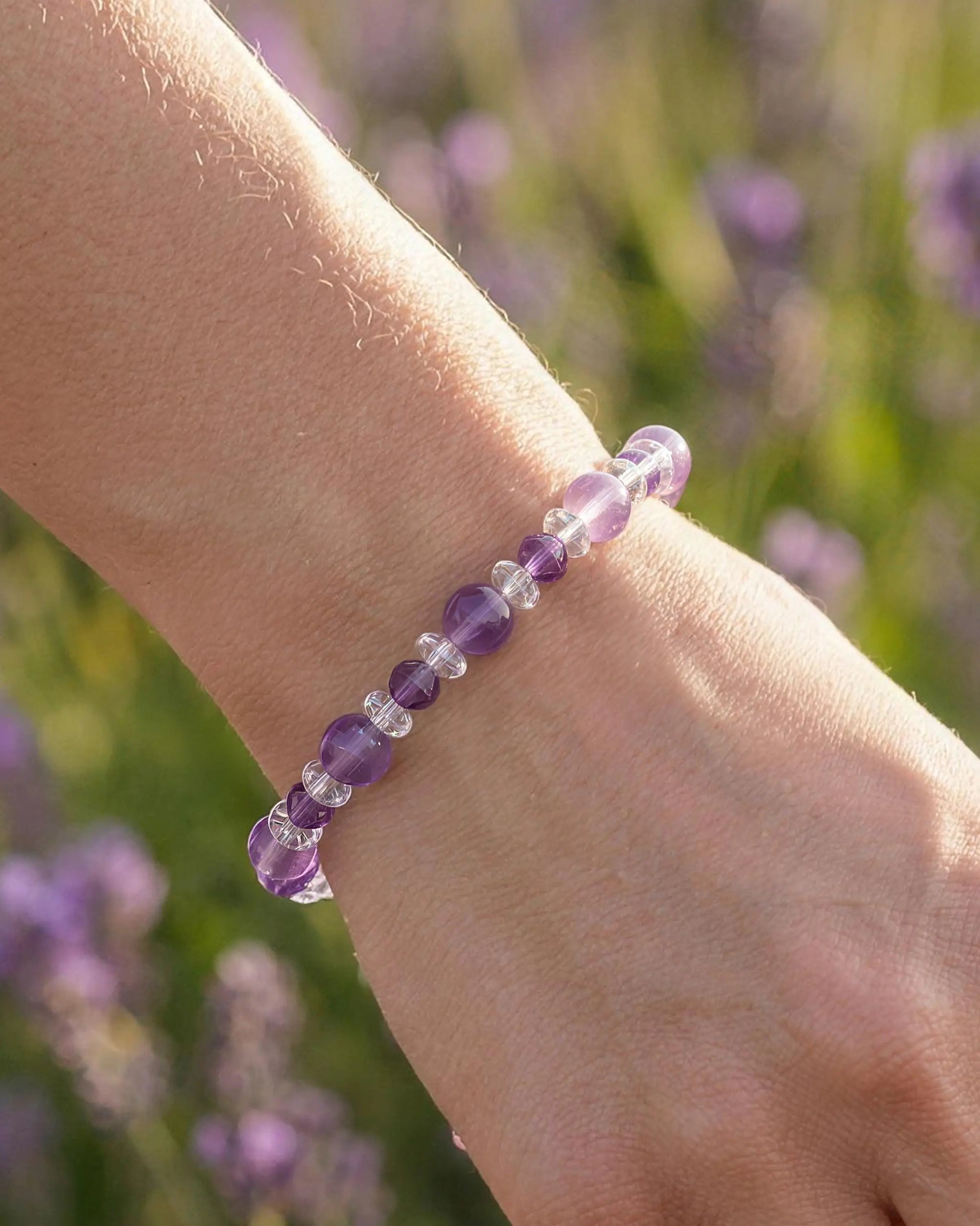 model wearing Amethyst and Clear Quartz Silver Bracelet