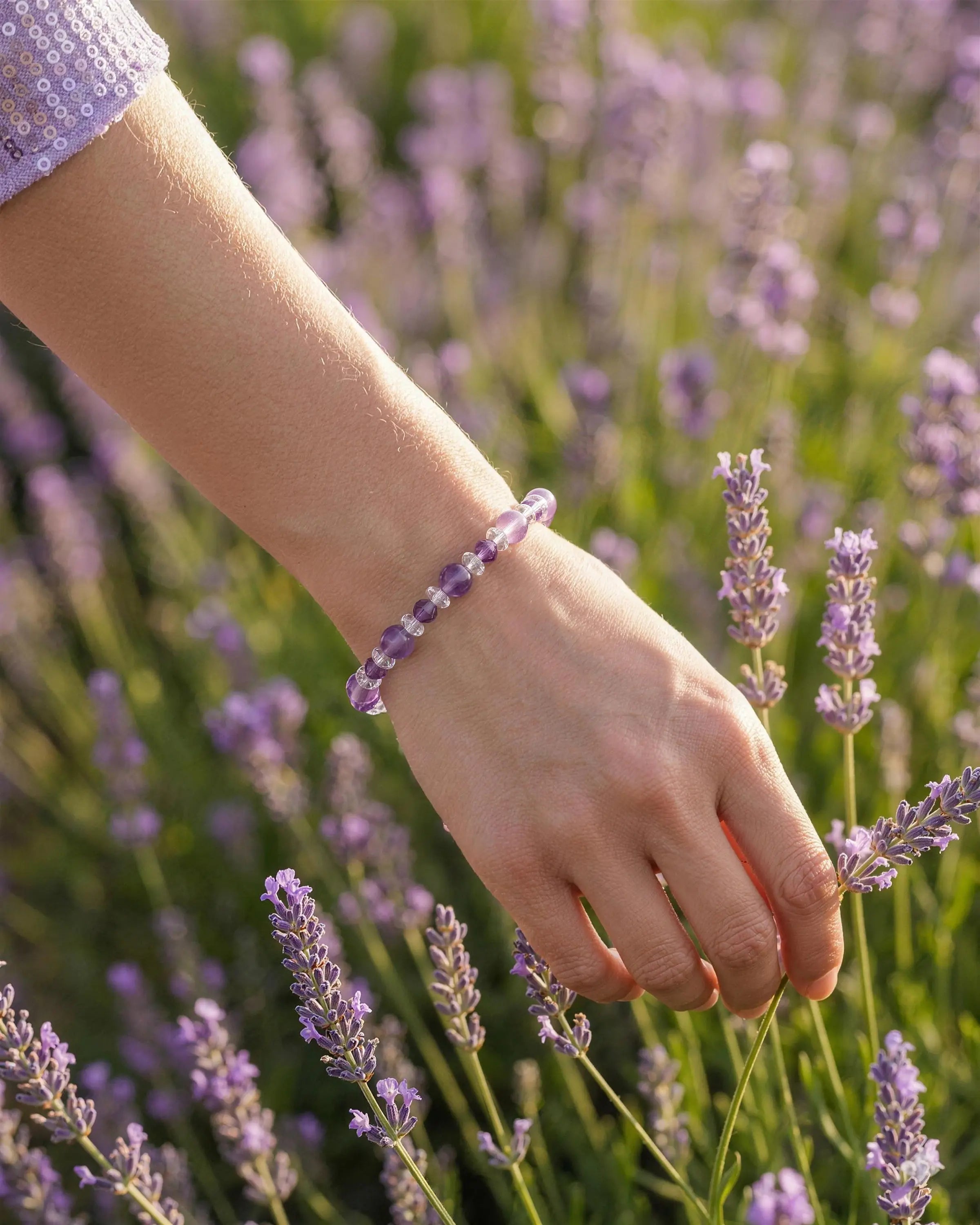 model wearing Amethyst and Clear Quartz Silver Bracelet