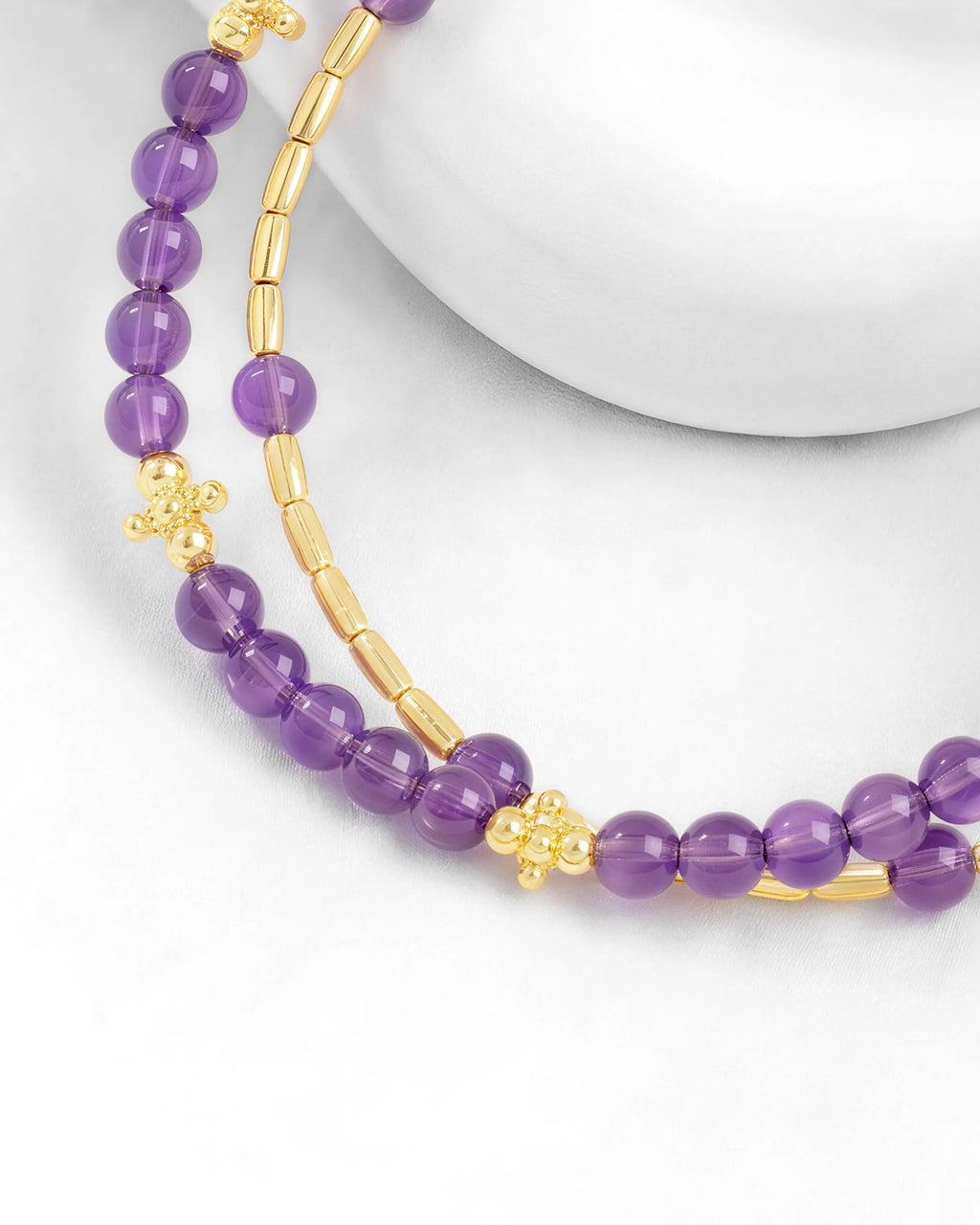 detail of Amethyst Gold Floral pre-layered bracelet