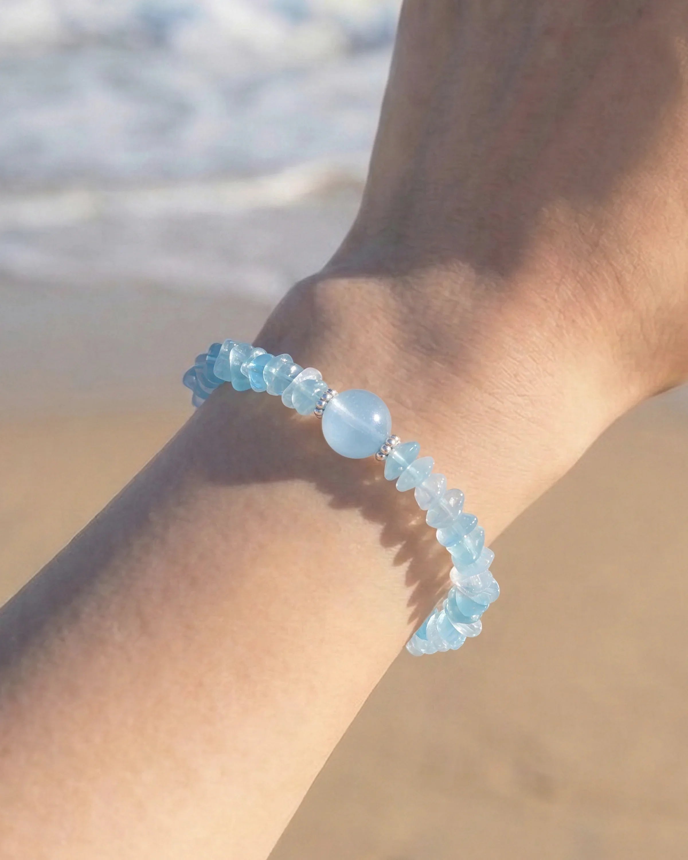 Close-up of Aquamarine Silver Freeform Chips Focal Bracelet on wrist