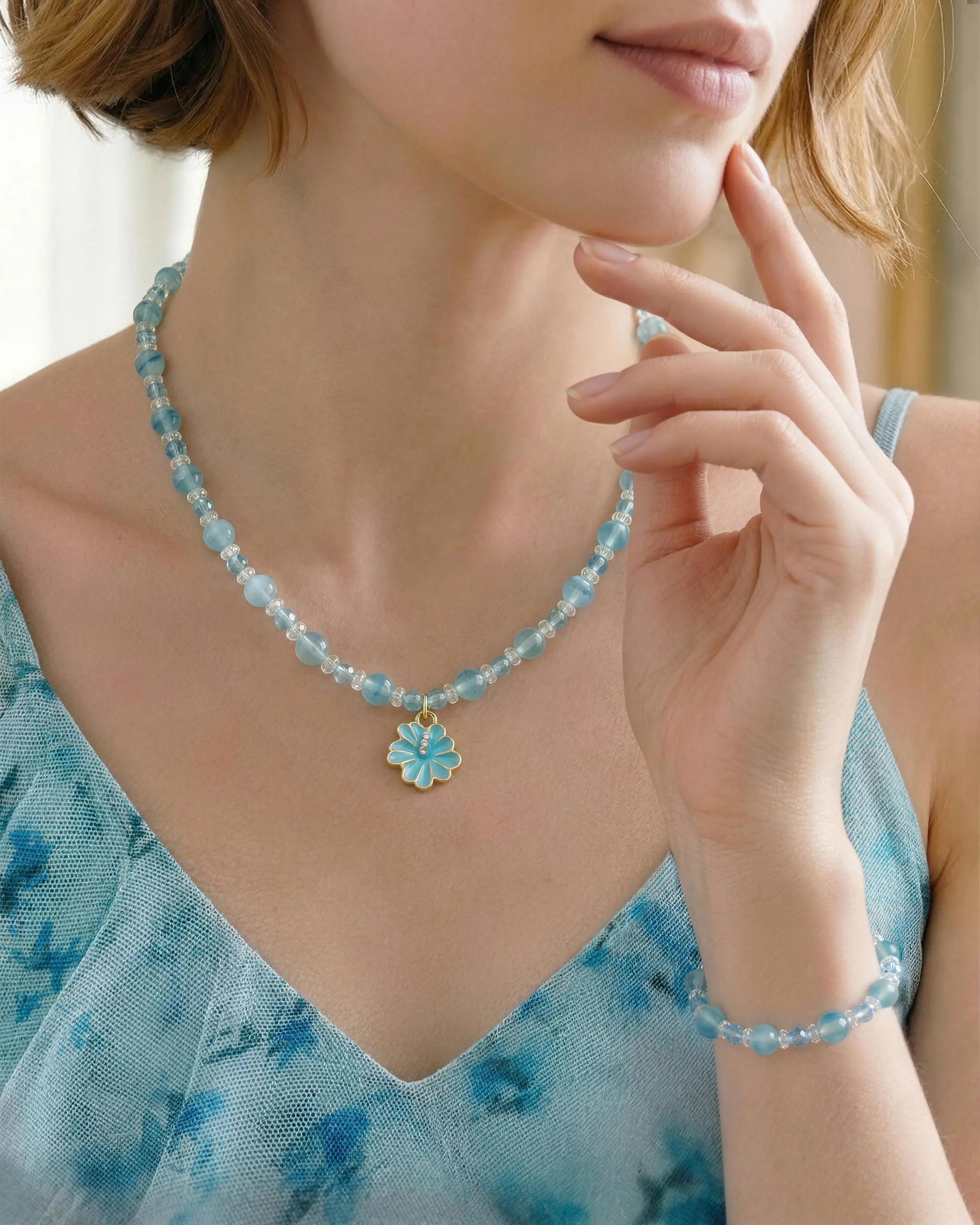 model wearing Blue Chalcedony Sakura Silver Necklace and Bracelet Set