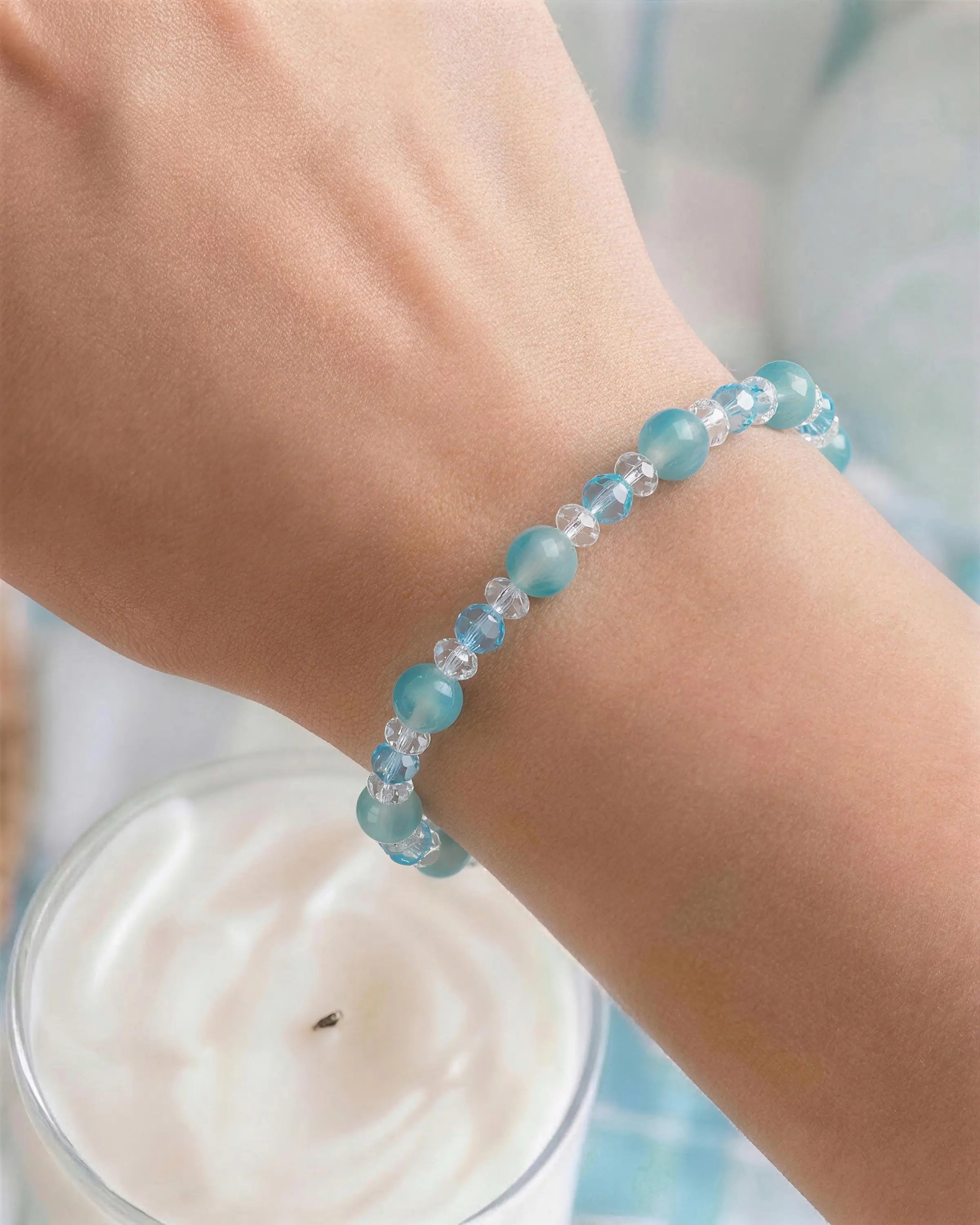 Close-up of Blue Chalcedony and Clear Quartz Silver Bracelet on Wrist