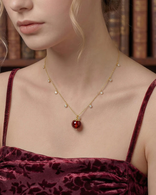 Model Wearing Garnet Gold Orbit 10mm Necklace