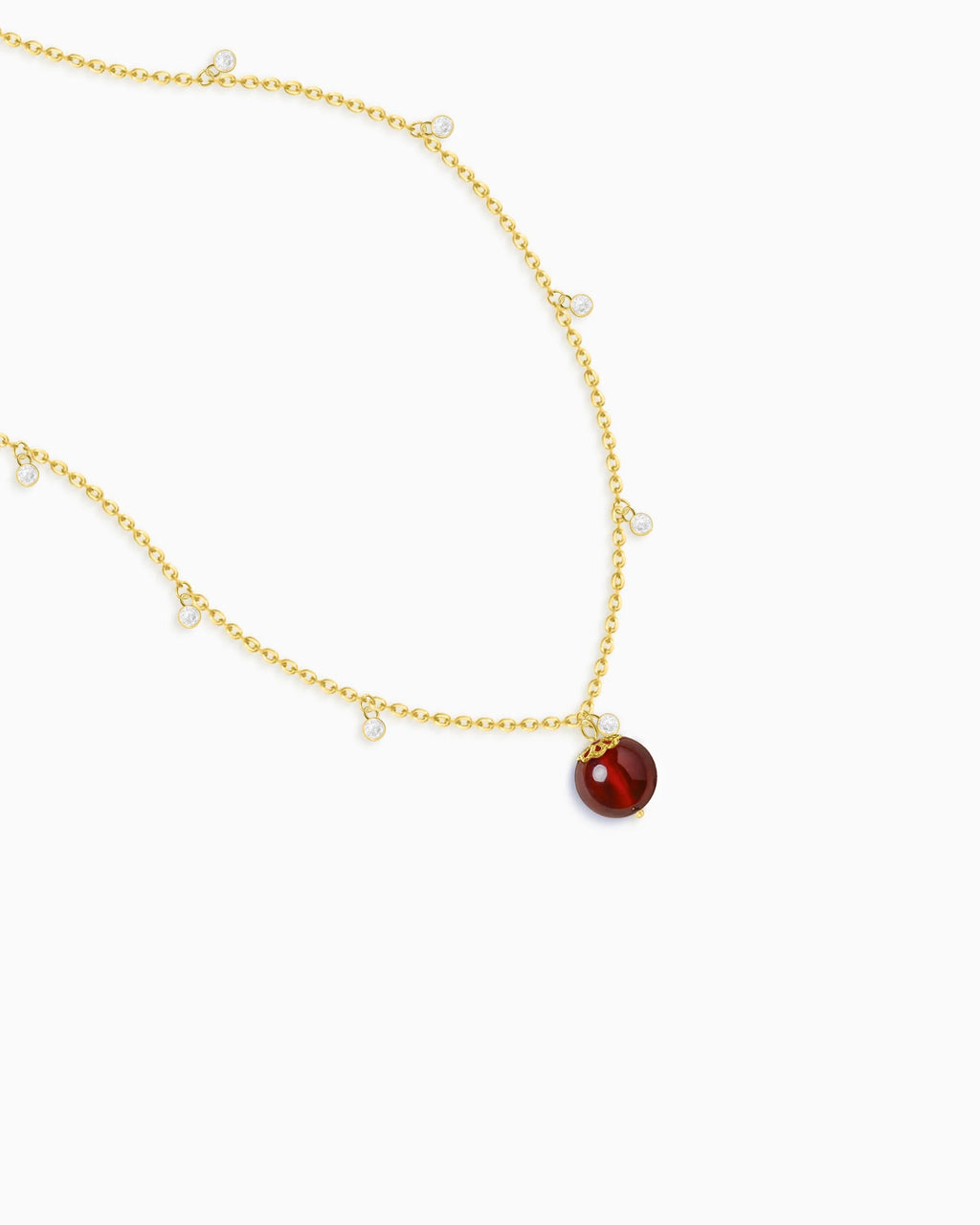 Garnet bead detail of Gold Orbit Necklace
