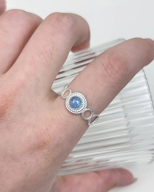 Close-up of Aquamarine Luminous Adjustable Ring