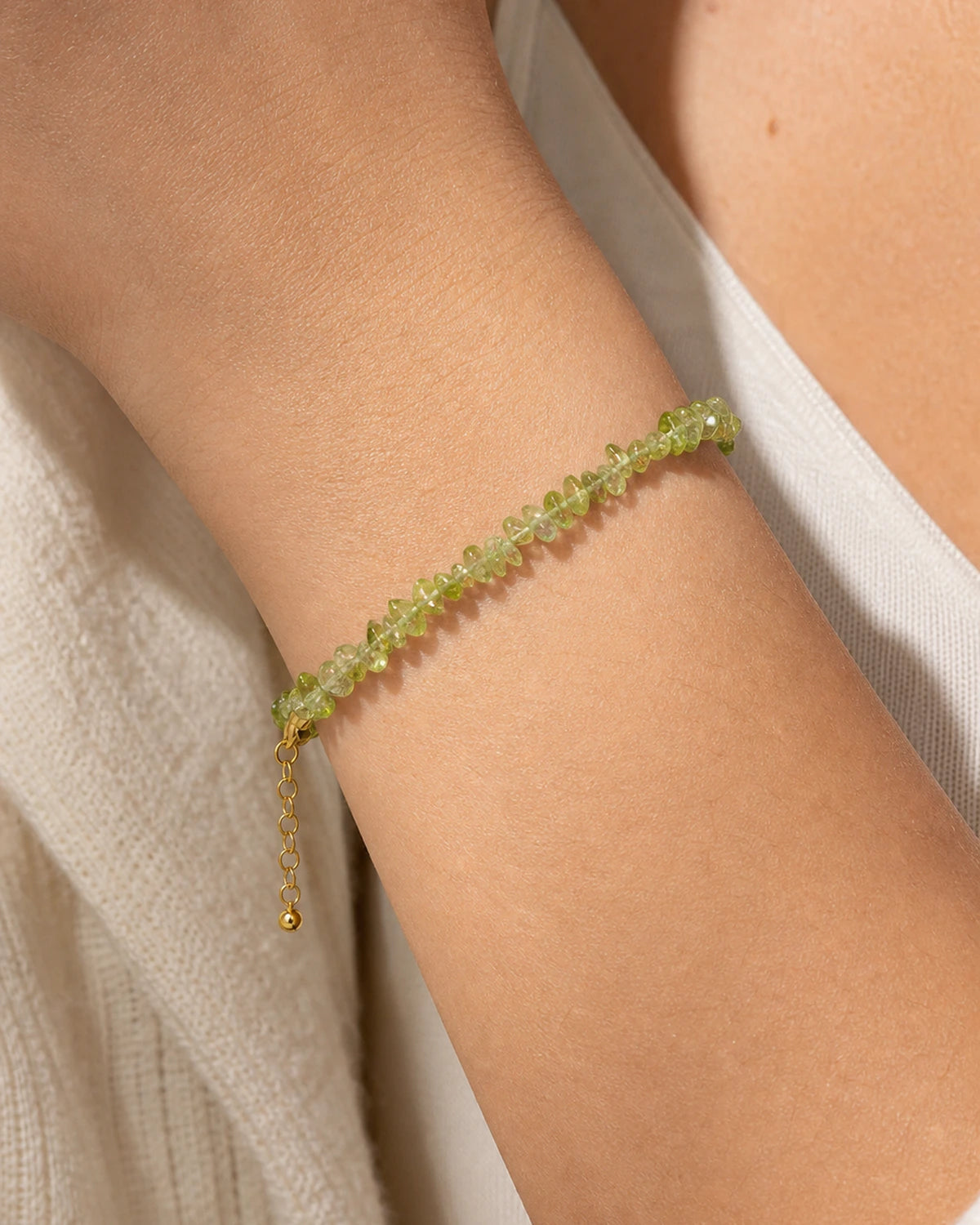 Peridot chip beaded bracelet styled on model