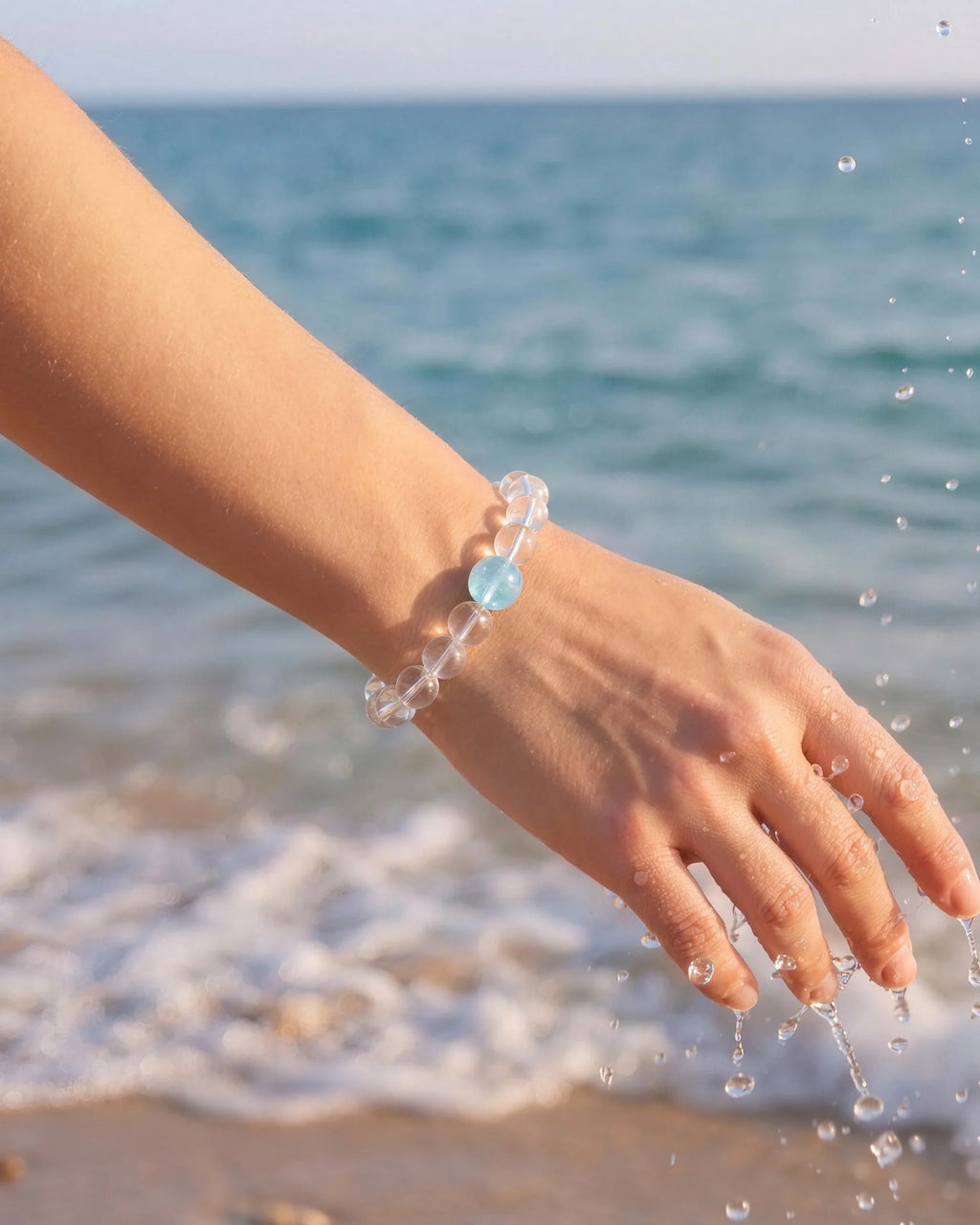 Model wearing Ocean Drop Clear Quartz Aquamarine Bracelet