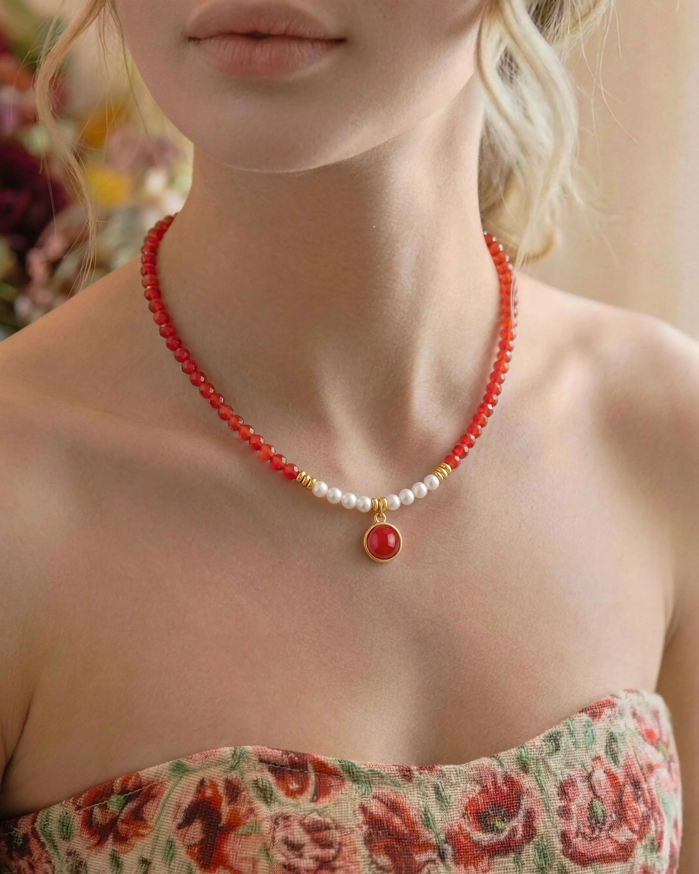 Model wearing Red Agate Pearl Gold 12mm Gemstone Pendant Necklace