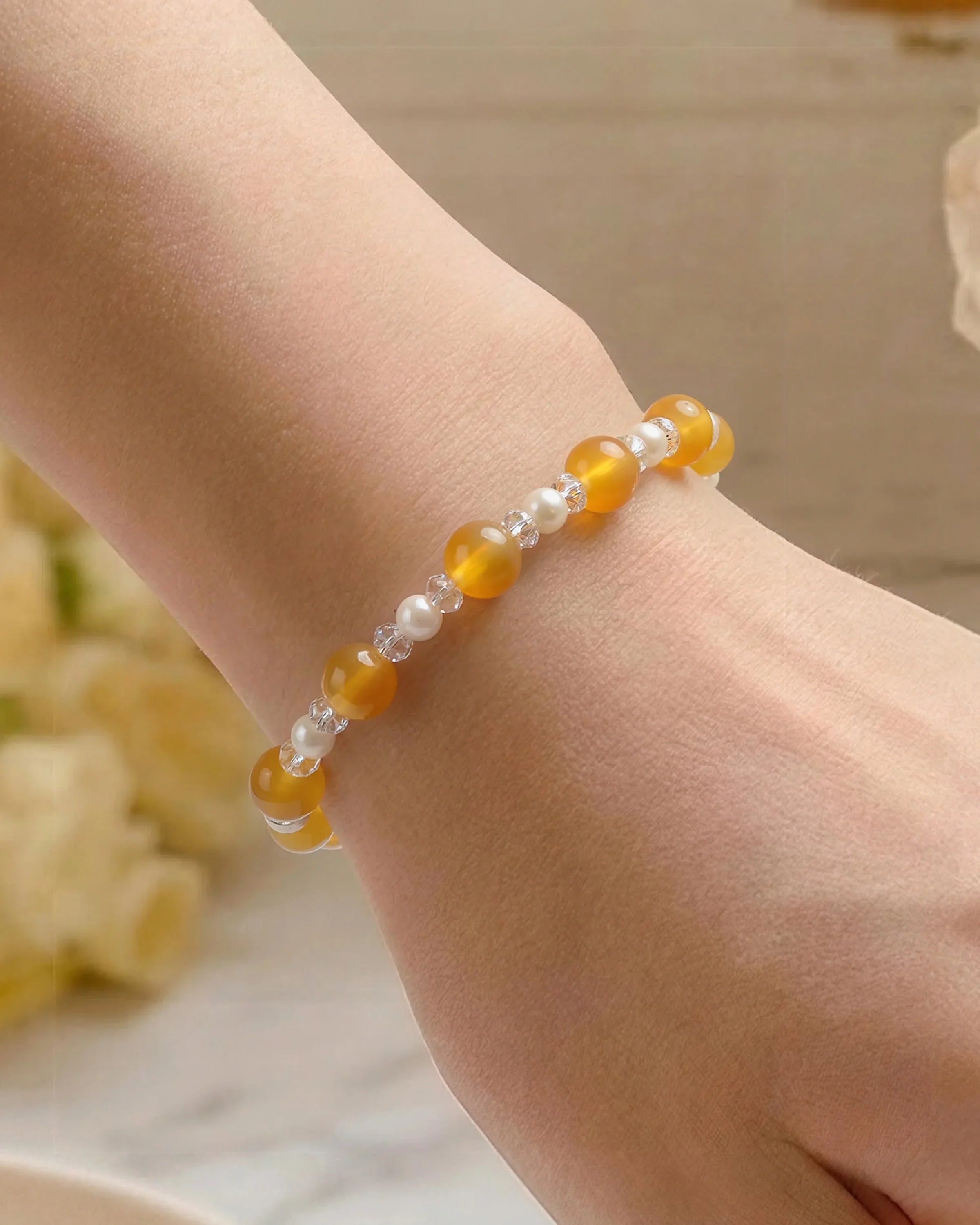 Close-up of Yellow Jade and Pearl Silver Bracelet