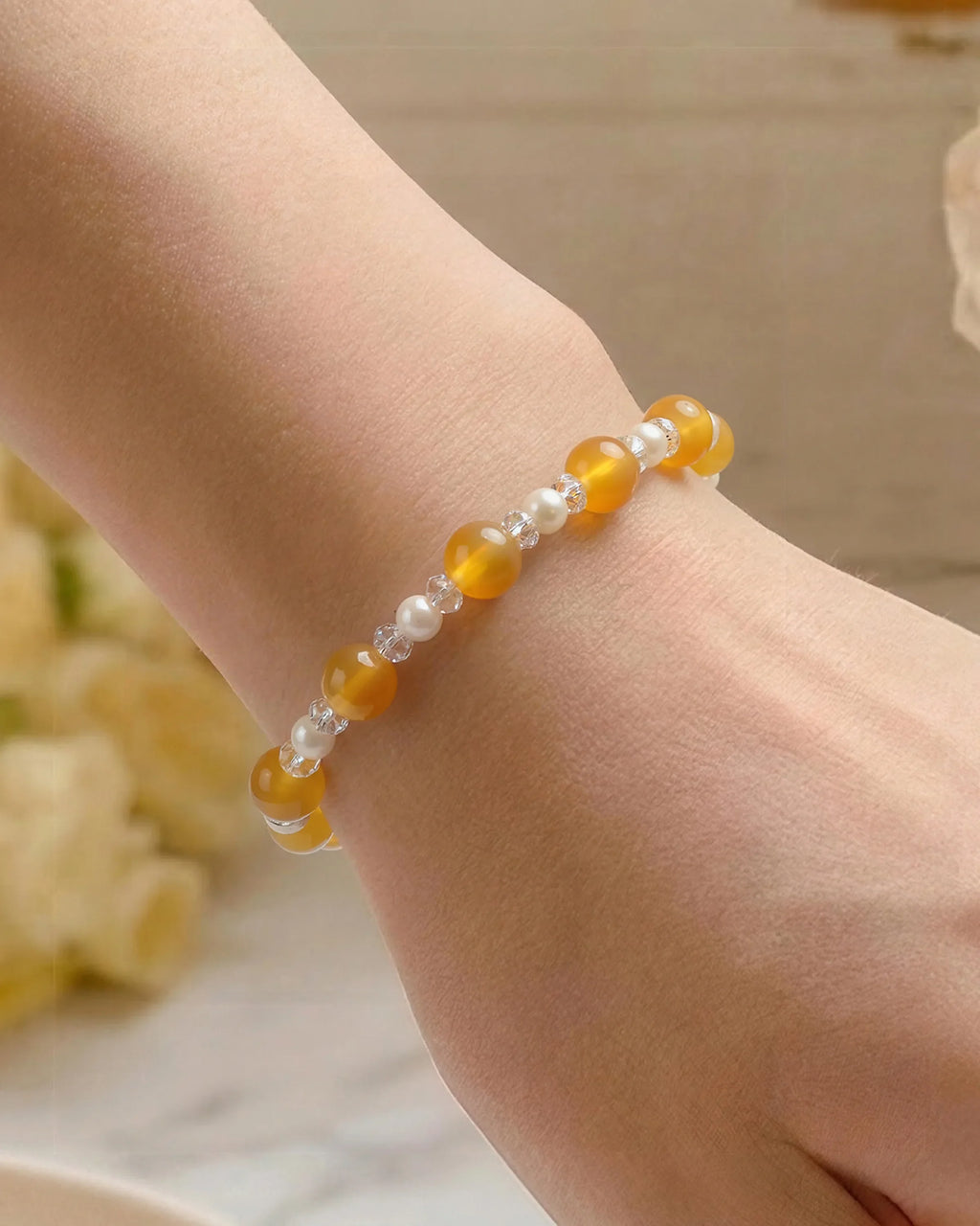 Close-up of Yellow Jade and Pearl Silver Bracelet