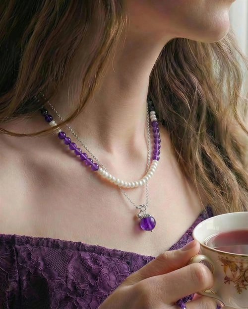 Close-up of Amethyst Pendant and Pearl Beaded Necklace Set