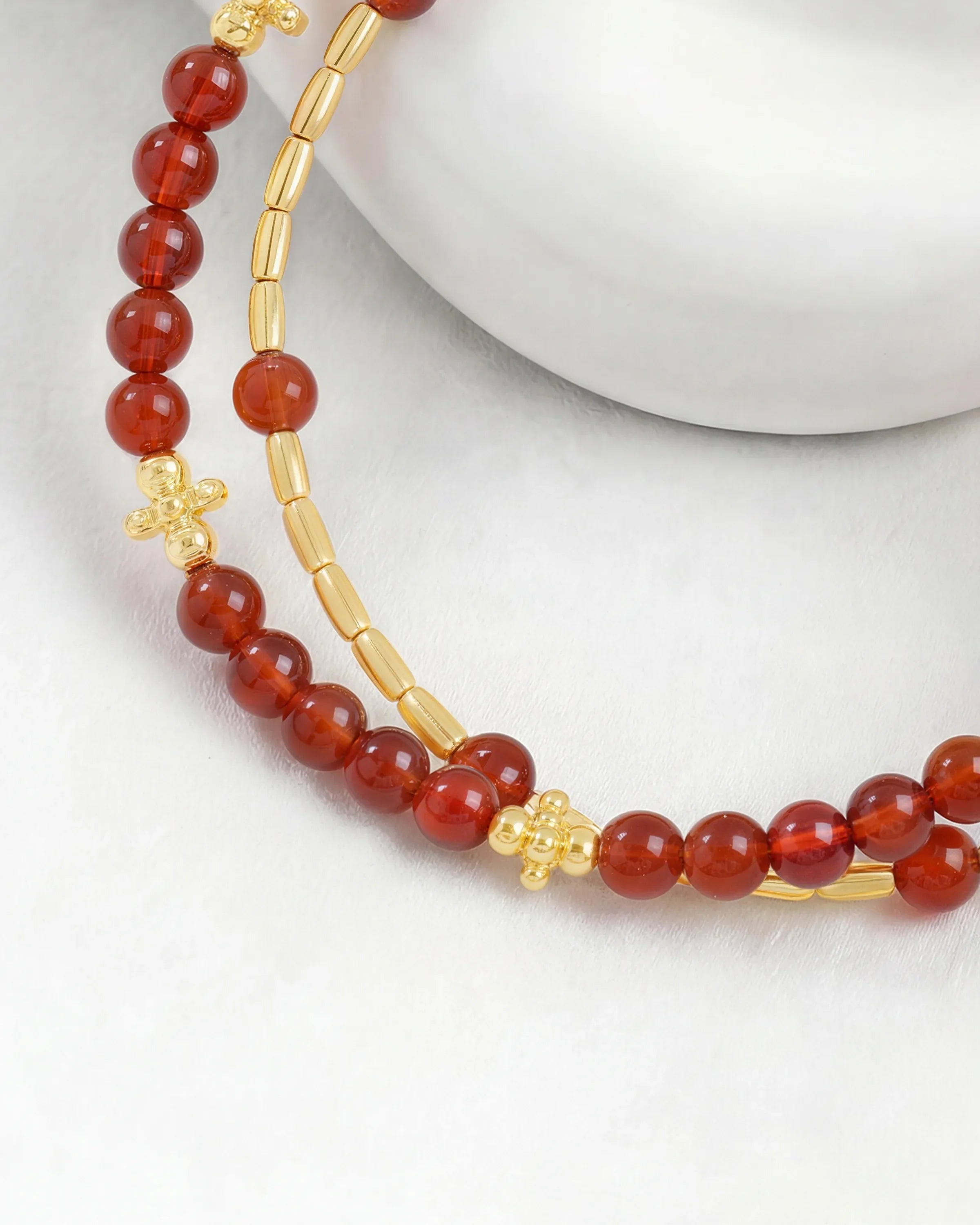 details of red agate gold floral pre-layered bracelet