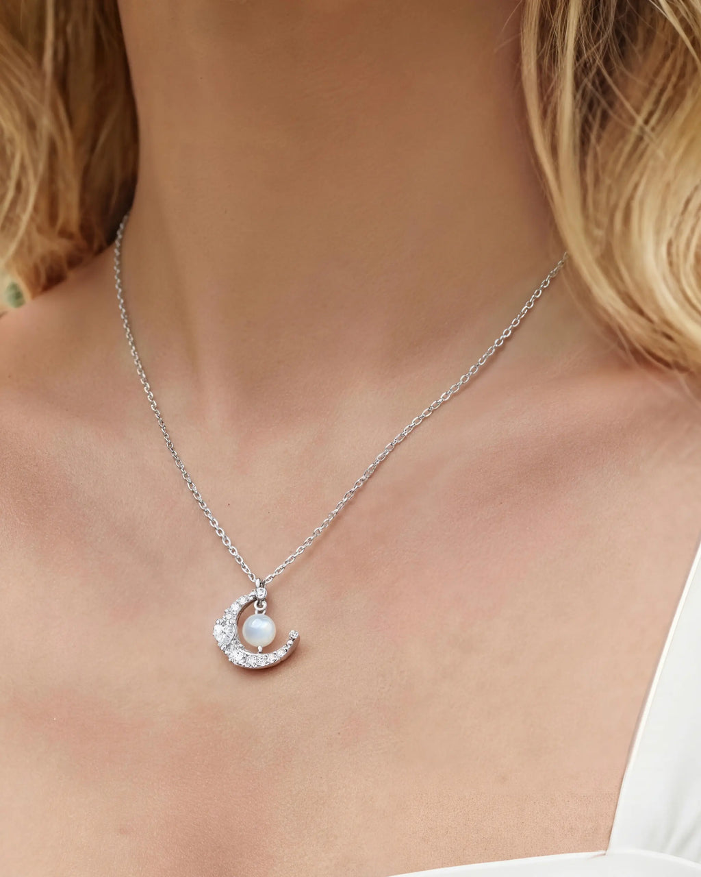 moonstone crescent pendant necklace on the model