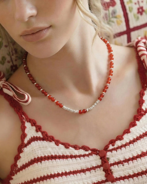 red agate beaded necklace worn by model