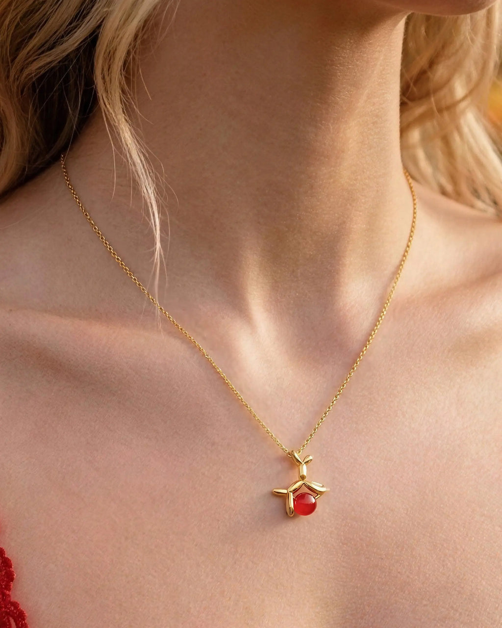 Red Agate Dog Pendant Necklace on the model