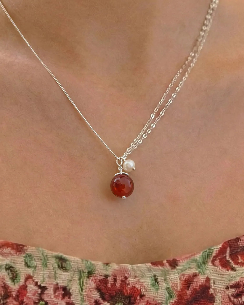 red agate pendant necklace on model